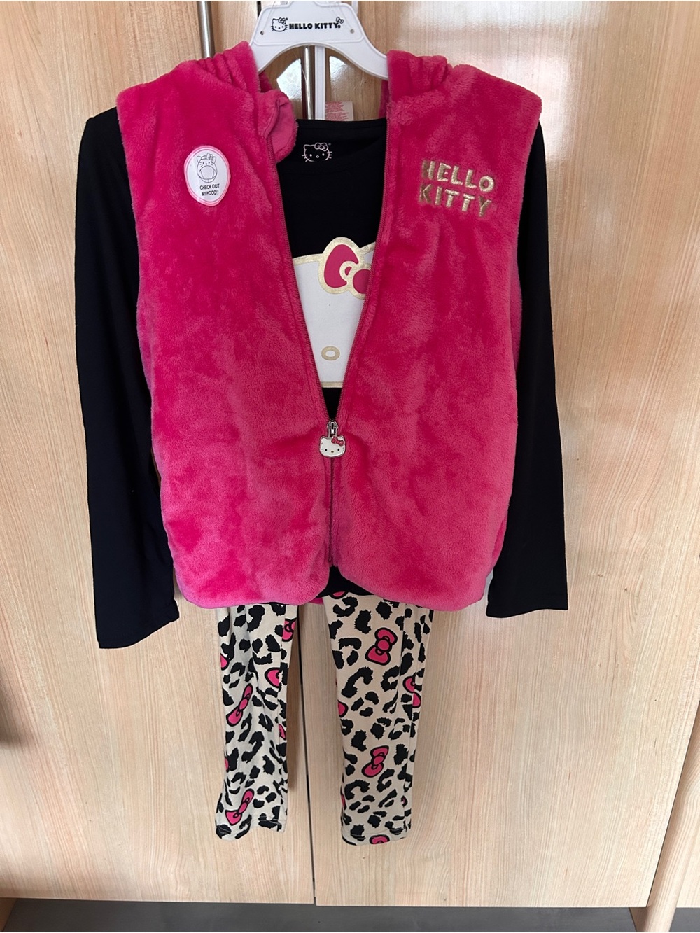 Hello Kitty Hot Pink Plush Hooded Vest with Zipper Charm